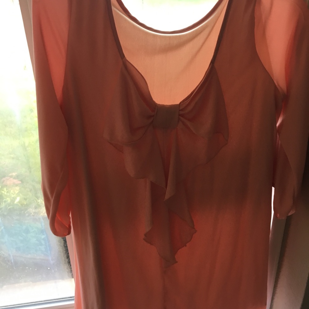 Loose fitted, flory peach bow back dress